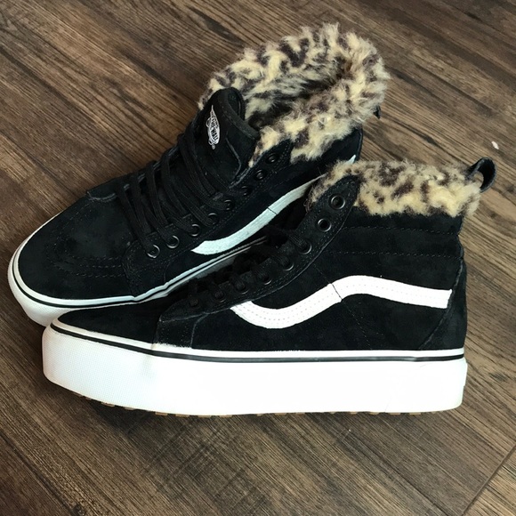black vans with cheetah fur